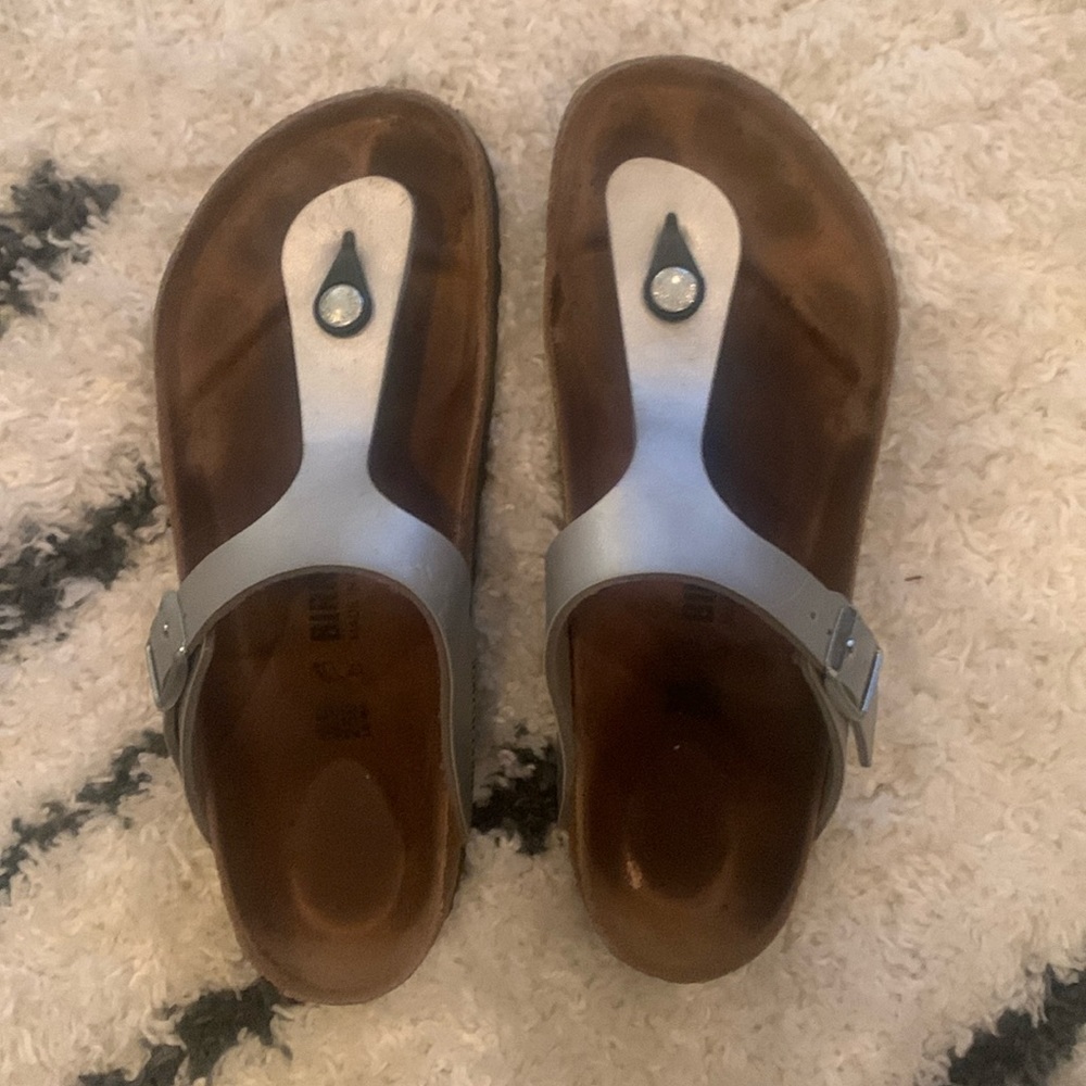 Birkenstocks size 39 silver Gizeh style in good condition.